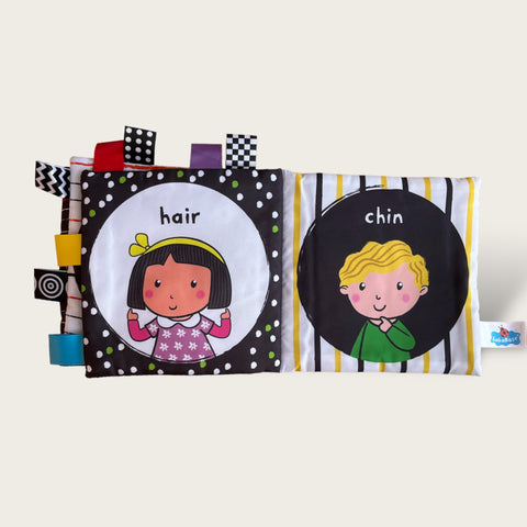 First books: Black and white cloth book (Faces )